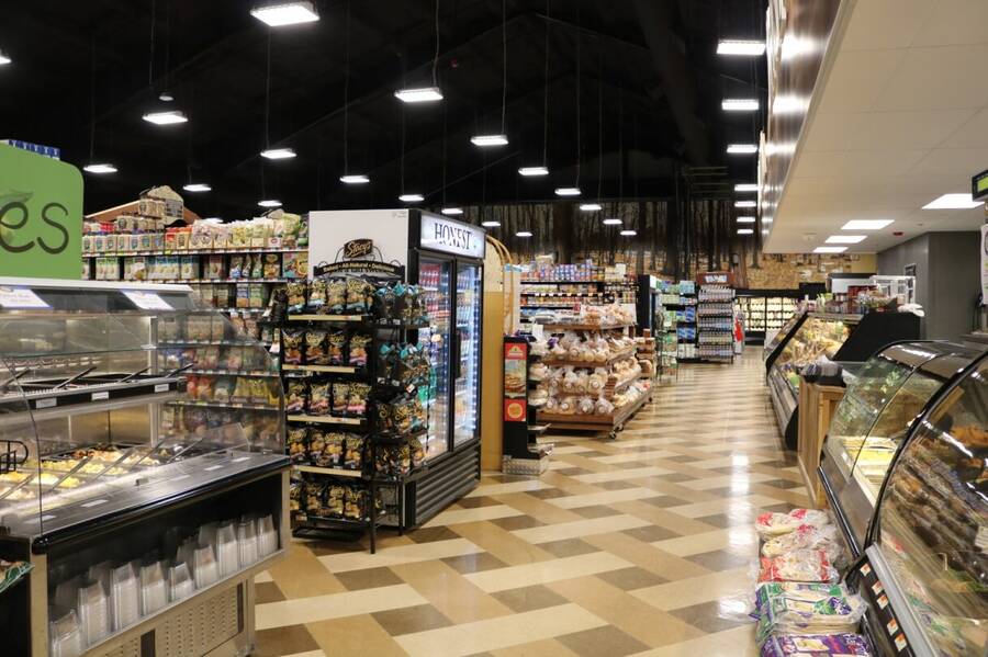 A long point of view picture of the inside of an AGNE partner store.